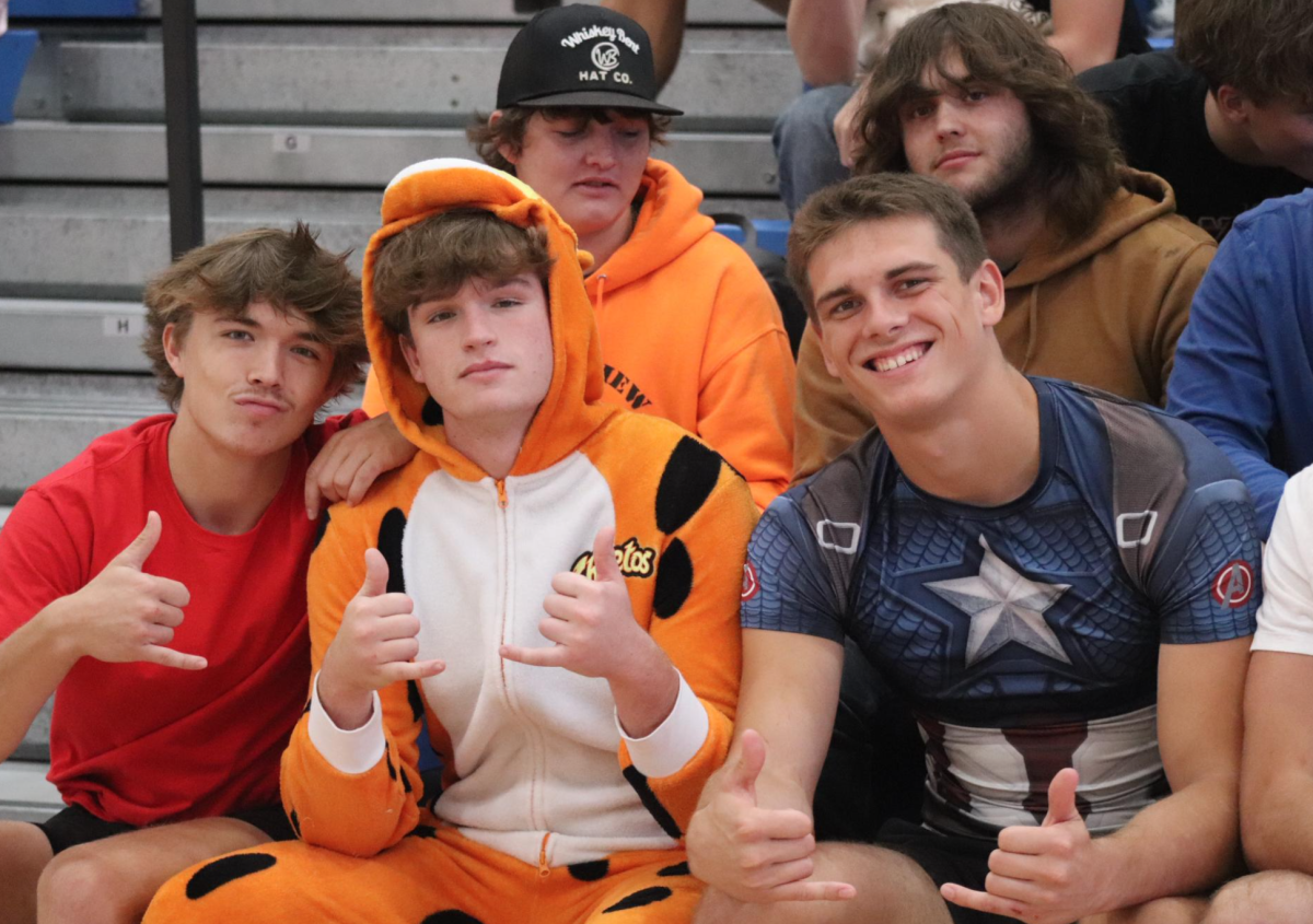 Peyton Matthies (12), Nathan Ehrte (12), and Broderick Brunssen (12) dressed up during HOCO week.